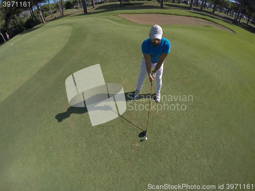 Image of top view of golf player hitting shot