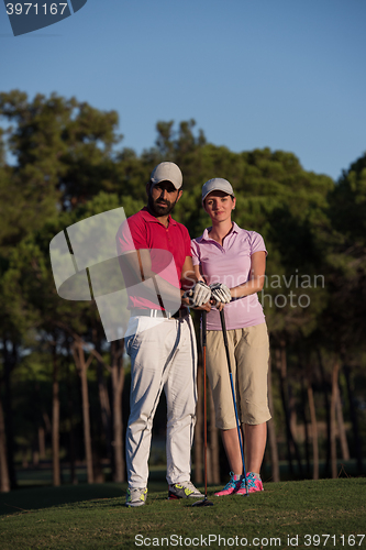 Image of portrait of couple on golf course