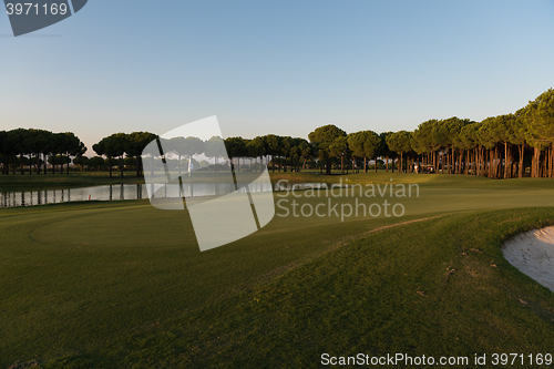 Image of golf course on sunset