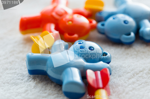 Image of close up of baby rattle on towel