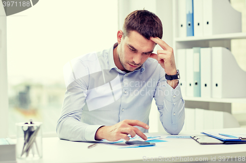 Image of close up of businessman with smartphone