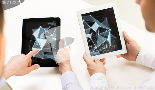 Image of close up of businessman hands with tablet pc