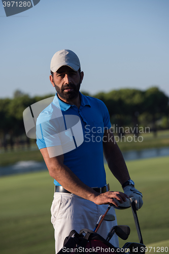 Image of golfer  portrait at golf course