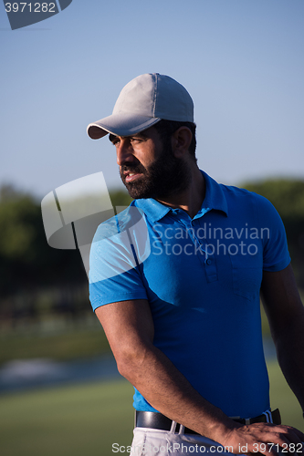 Image of golfer  portrait at golf course
