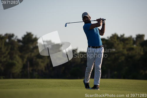 Image of golfer hitting long shot