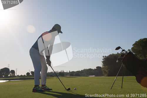 Image of golf player hitting shot