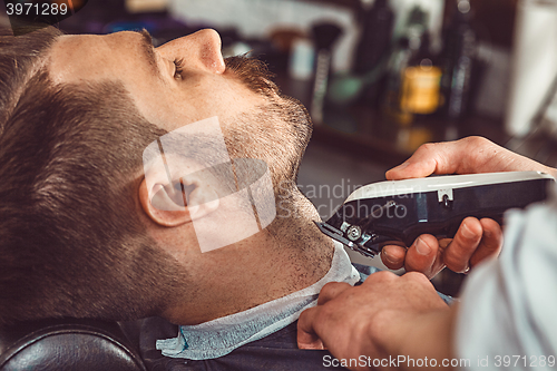 Image of Hipster client visiting barber shop