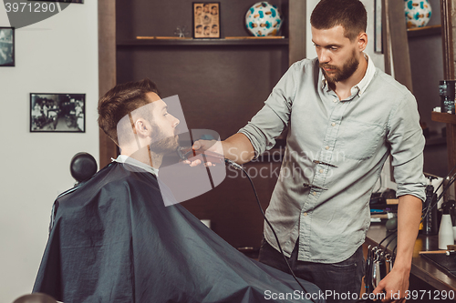 Image of Hipster client visiting barber shop