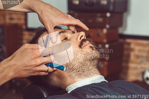 Image of Hipster client visiting barber shop