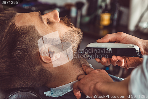 Image of Hipster client visiting barber shop