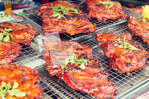 Image of meat grill at street market