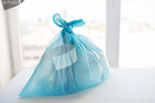 Image of close up of rubbish bag with trash at home