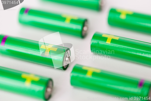 Image of close up of green alkaline batteries