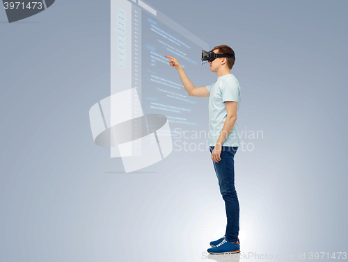 Image of happy man in virtual reality headset or 3d glasses