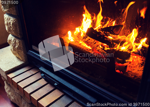 Image of close up of burning fireplace at home