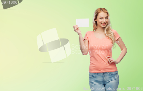 Image of happy woman or teen girl with blank white paper