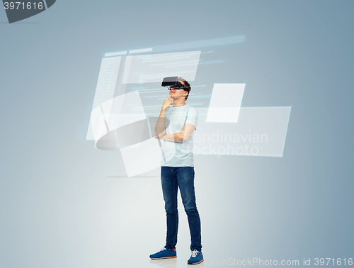 Image of happy man in virtual reality headset or 3d glasses