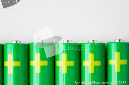 Image of close up of green alkaline batteries