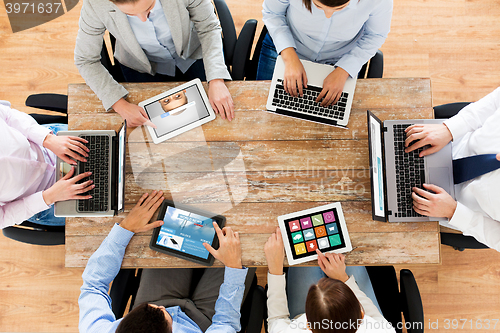 Image of business team with laptop and tablet pc computers