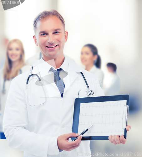 Image of male doctor with stethoscope showing cardiogram