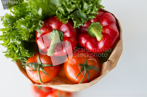 Image of basket of fresh ripe vegetables at kitchen