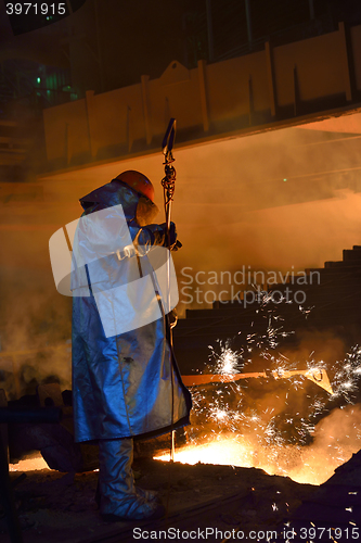 Image of Steel worker in plant