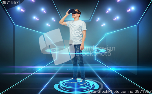 Image of happy man in virtual reality headset or 3d glasses