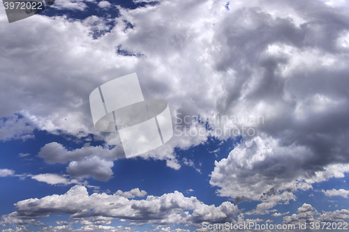 Image of Blue sky with clouds as background