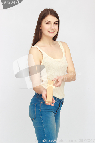 Image of Young woman with gift