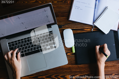 Image of Female designer working on computer