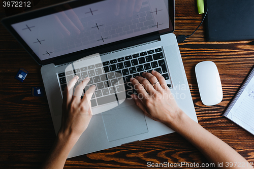 Image of Female designer working on computer