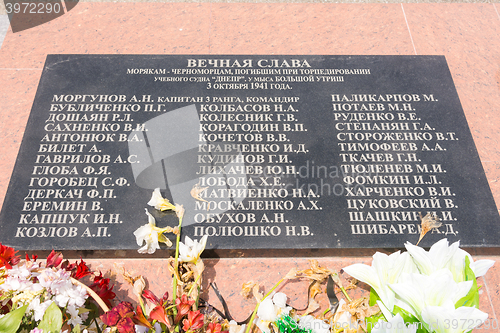 Image of Big Utrish, Russia - May 17, 2016: Memorial plaque at the monument, the lighthouse on the island of Utrish, in honor of the Black Sea sailors who died in the torpedoing of the training ship \"Dnepr\" 