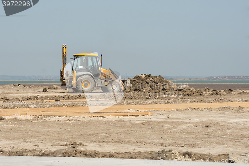 Image of Excavator prepare the site for construction