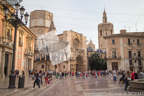 Image of Square of Saint Mary\'s, fountain Rio Turia and Valencia Cathedral in a cloudy day. Valencia, Spain.