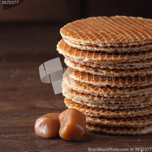 Image of Waffles with caramel on wood