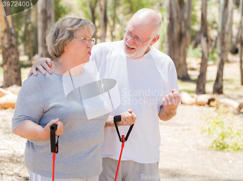Image of Happy Senior Couple Exercising Outside Together