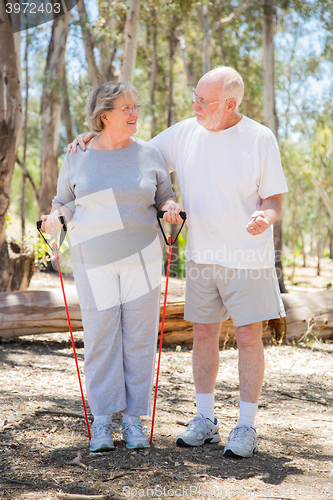 Image of Happy Senior Couple Exercising Outside Together