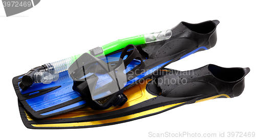 Image of Mask, snorkel and flippers of different colors with water drops