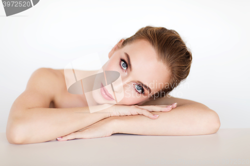 Image of beautiful young woman face and hands