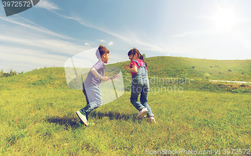 Image of group of happy kids running outdoors