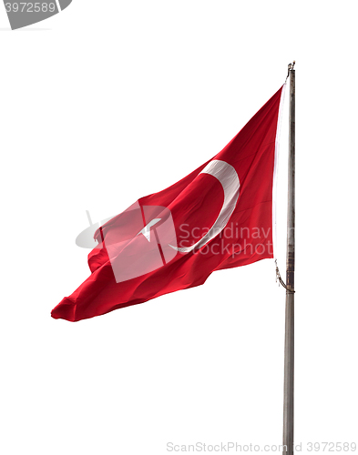 Image of Turkish flag on flagpole waving in windy day