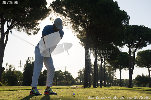 Image of golf player hitting shot