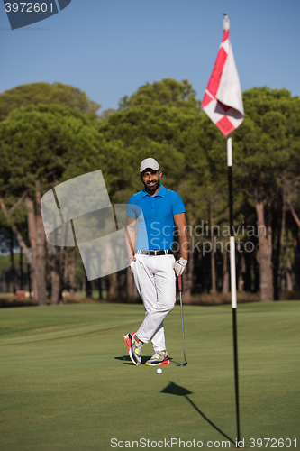 Image of golf player portrait at course
