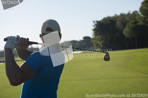 Image of golf player hitting shot