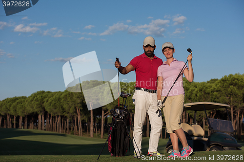 Image of portrait of couple on golf course