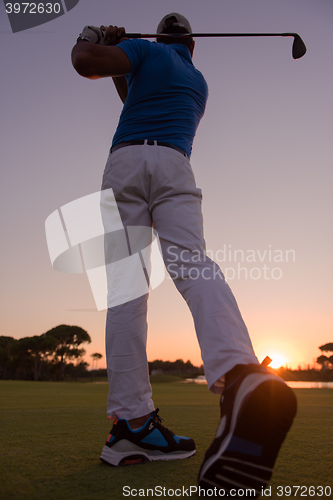 Image of golfer hitting long shot