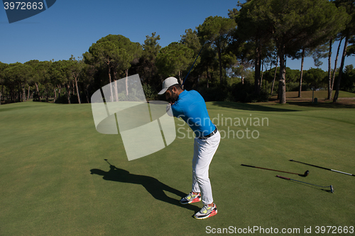 Image of golf player hitting shot