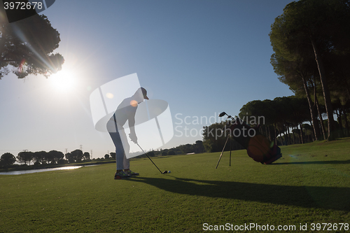 Image of golf player hitting shot