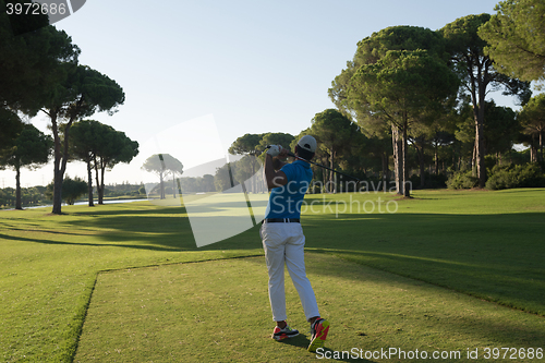 Image of golf player hitting shot