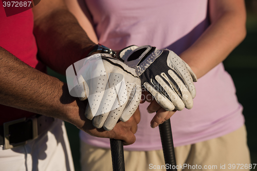 Image of portrait of couple on golf course